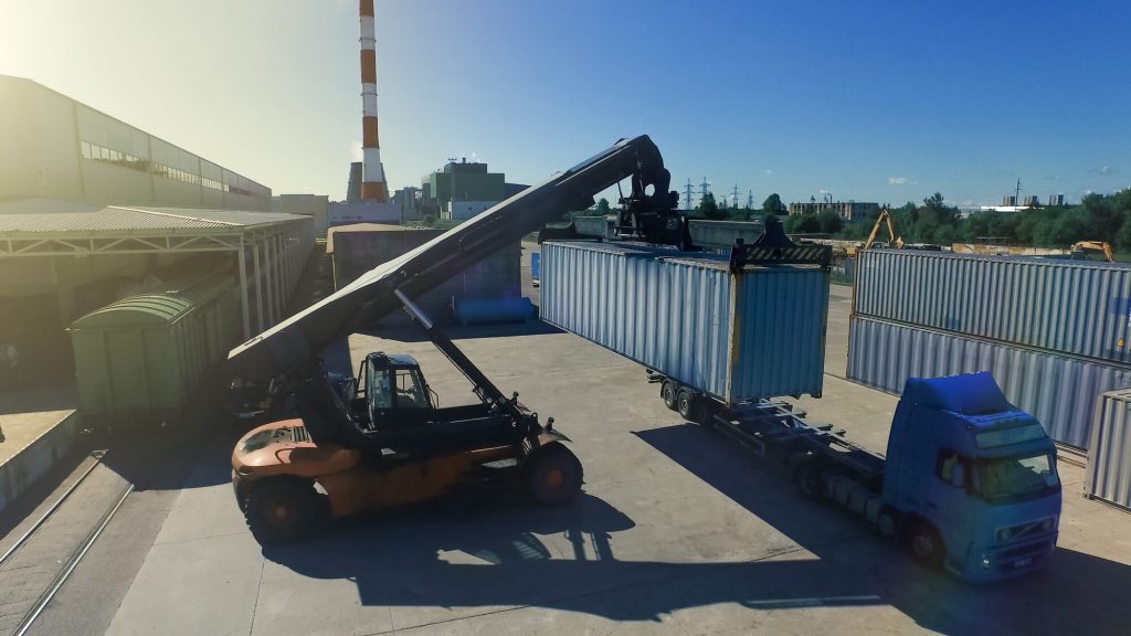 Container handler is loading container onto a truck