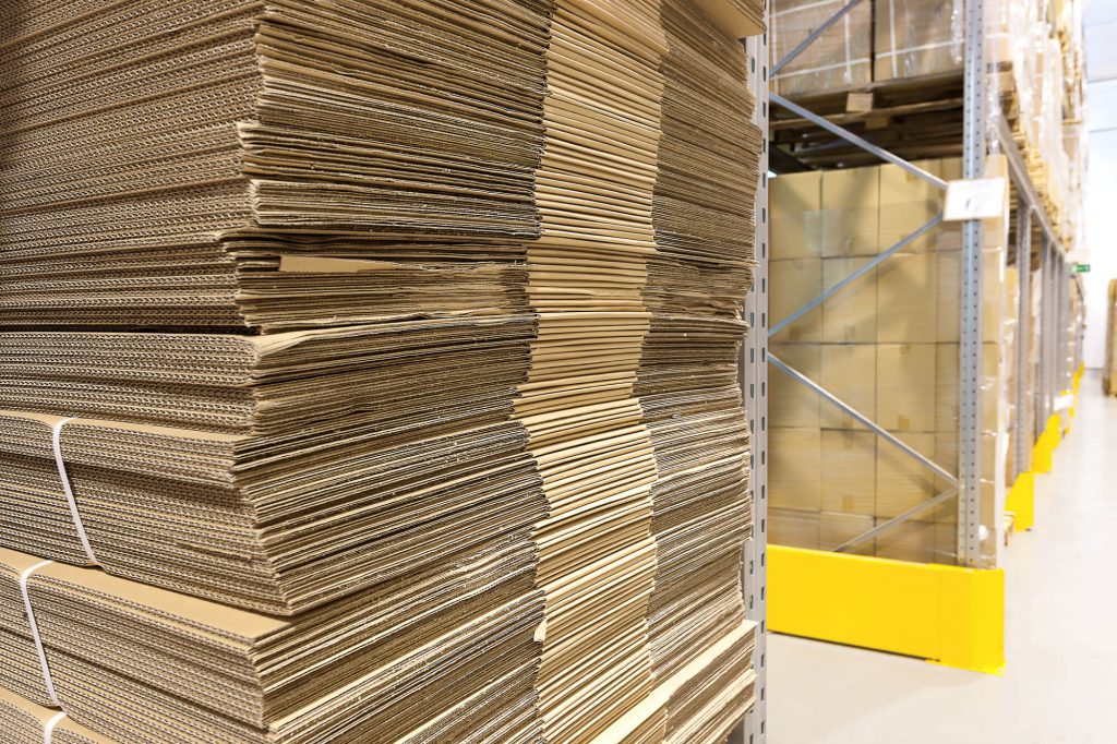 Stacked corrugated flat boxes